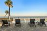 new poolNew oceanfront pool installed in 2024, featuring heating, a sun shelf, bubblers, and a 7-foot-deep end, with expansive patio space and panoram