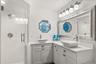 Master ensuite bathroom with updated finishes and statement window and skylight