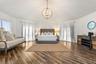 Primary suite: Spacious coastal retreat with ocean views, two large walk-in closets, and access to an oversized composite terrace overlooking the Atla