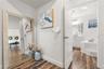 Master suite entrance with access to laundry room, ensuite bathroom and walk in closet