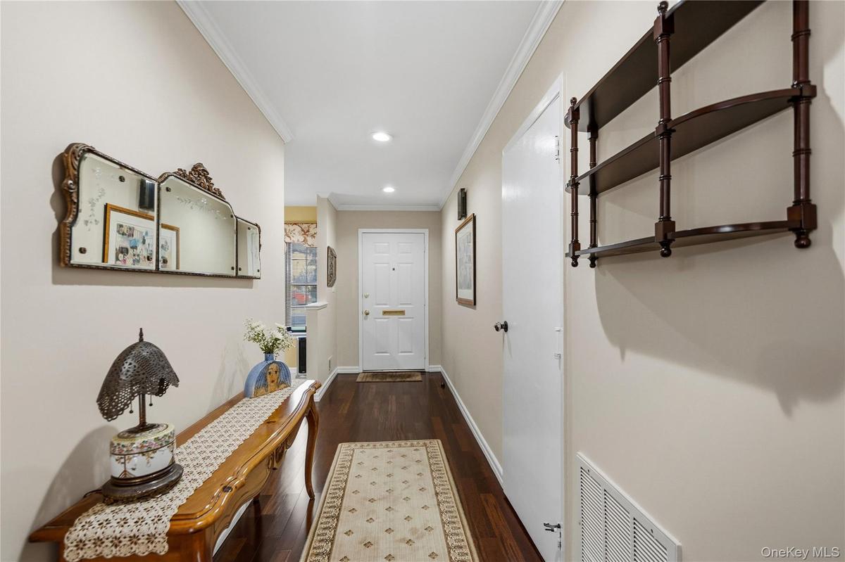 The Entry Foyer Has Warm  Custom Oak Flooring!