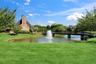 This Pond Offers A Bridge to The Clubhouse!