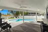 Fabulous covered back patio, pavered pool deck and new pool