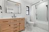 Guest Bathroom with Beautiful vanity and tile work