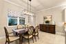 Spacious dining room tucked just off the main living area