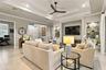 Great Room with Crown Molding & Tray Ceiling