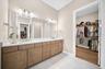 Primary bathroom and 2nd walk-in closet