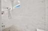 Large walk-in shower in seat