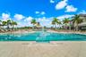 Community pool with pool side Sail Fish Restaurant