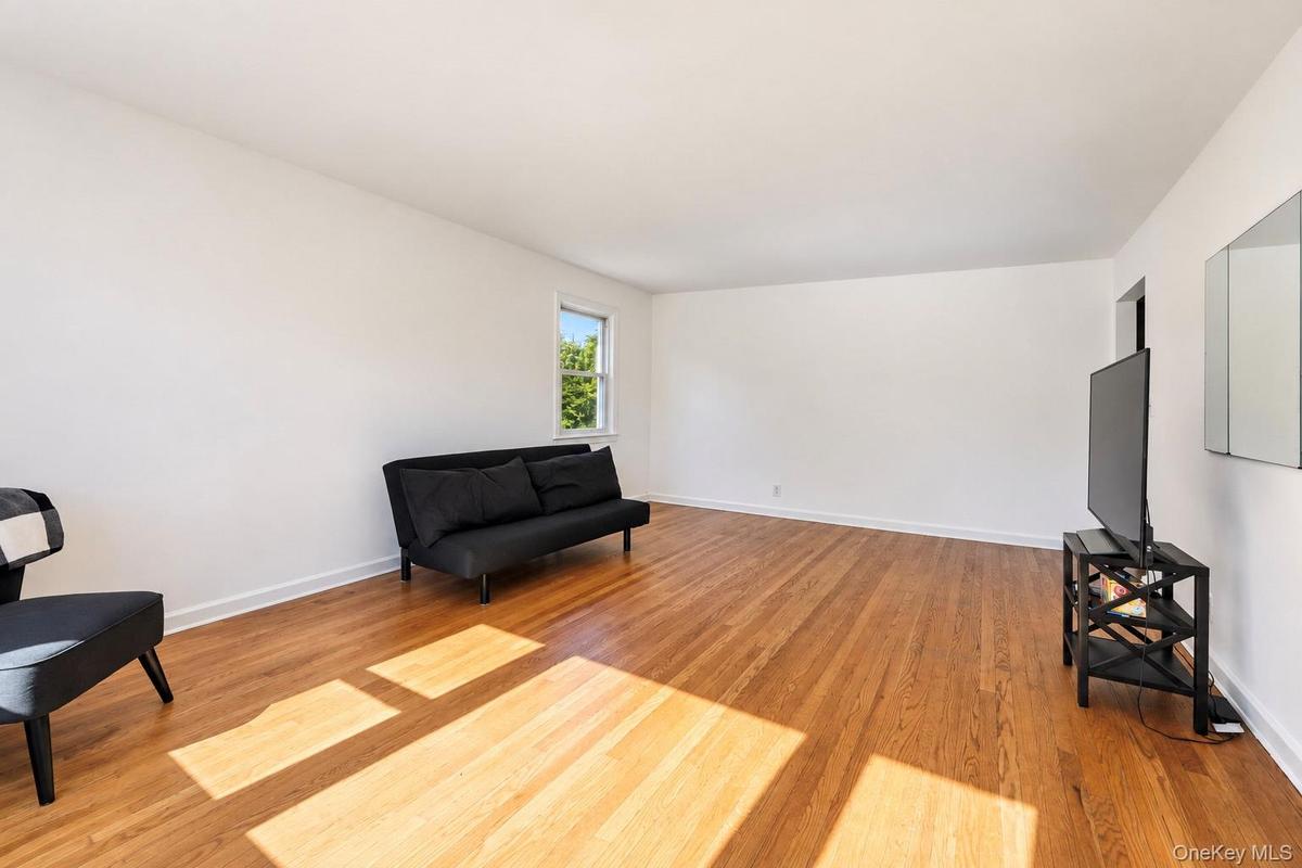 Living room with dining area other view