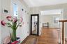 Entry opens to the living room & family room
