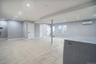 Basement featuring washer / dryer, recessed lighting, and a wall mounted air conditioner