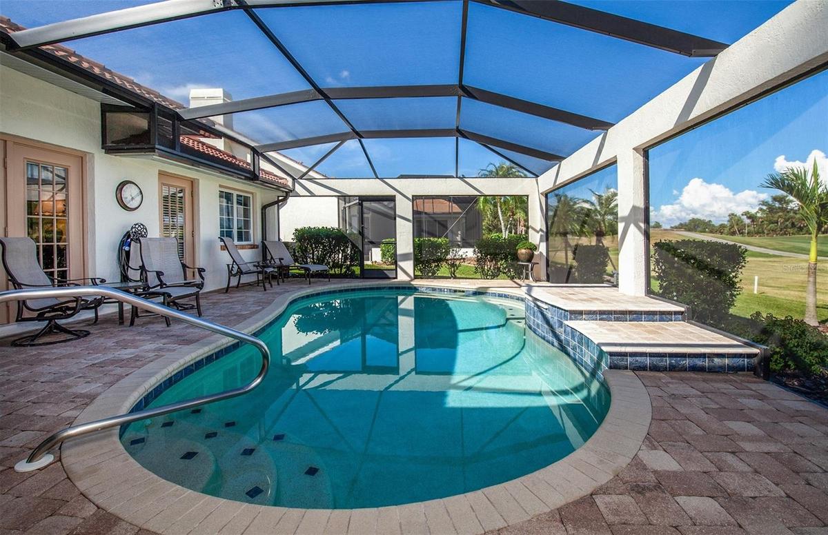 Pool with screen enclosure