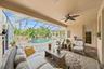 Pool, lanai, pavers, and tropical landscaping create an exceptional setting for gatherings.