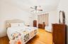 Additional bedroom is positioned toward the rear of the home.