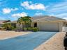 FrontExterior_2903rdStreet_BonitaSprings_TwoCarGarage_Daylight.jpg