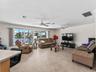 DiningLiving_2903rdStreet_BonitaSprings_OpenConcept_WindowView.jpg