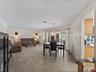 DiningLiving_2903rdStreet_BonitaSprings_OpenConcept_LanaiView.jpg