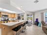 KitchenGreatRoom_2903rdStreet_BonitaSprings_OpenConcept_Corner.jpg