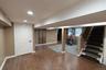 An additional perspective showing the lower level space configuration and space.