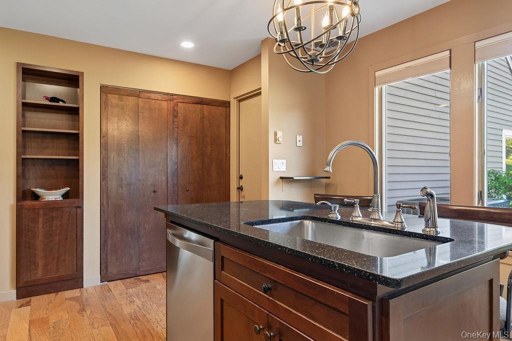 There is laundry behind the closet doors, and entry to the garage in the corner
