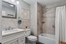 This beautifully updated bathroom is in bedroom #2