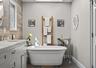 Primary, en-suite bathroom, complete with soaking tub
