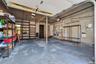 This garage comfortably fits 2 cars, even that big SUV, and you still have plenty of space for storage