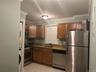 Unit 2 - Kitchen with in-Unit Washer & Dryer