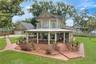 Drone view of home and detached garage