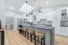 Exceptional kitchen with Quartz counter and large kitchen island