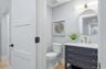 Half Bath with Carrera Marble Vanity