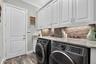Interior Laundry Room w/Upgraded Cabinetry & Granite Countertops