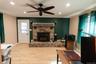 This living area has a beautiful stone fireplace as a focal point for gatherings and every day comfort.