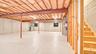 Expansive unfinished basement featuring exterior entrance, utilities and crawl space