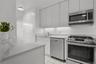 Cabinetry reaches Ceiling for Additional Storage