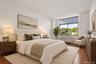 Virtually Staged Bedroom with 2 Closets and Sunlight from Western Exposure