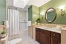 spacious family bathroom with tub/shower