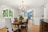 Formal dining area open to living room for extended entertaining