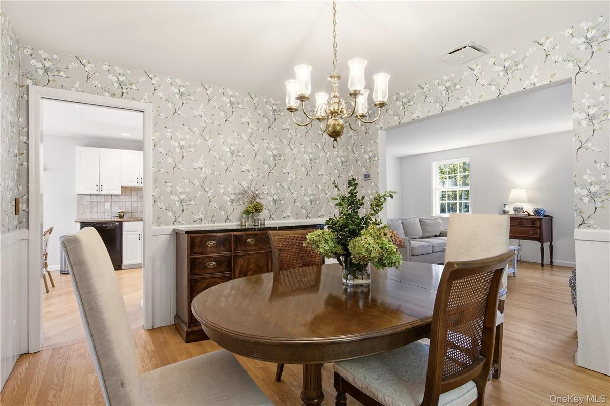 Dining room leads to kitchen, living room and family room