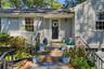 Welcoming front door , sweet area to sit outside