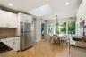 kitchen leads to dining room and family room