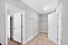 Primary closet virtually staged