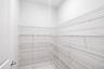 Walk in pantry virtually staged