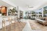 Sun room entry looking into dining and kitchen from family room
