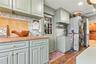 Laundry room with sink access to garage