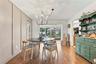 Dining room leading to Sun room, kitchen and primary bedroom suite