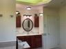 Linen closet to the right of vanity.