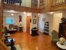 The door to the left is a closet, hall to the right leads to den and indoor utility rooms
