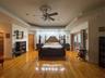 The hall way to the left leads to the ensuite with two walking closets, linen closet and bathroom